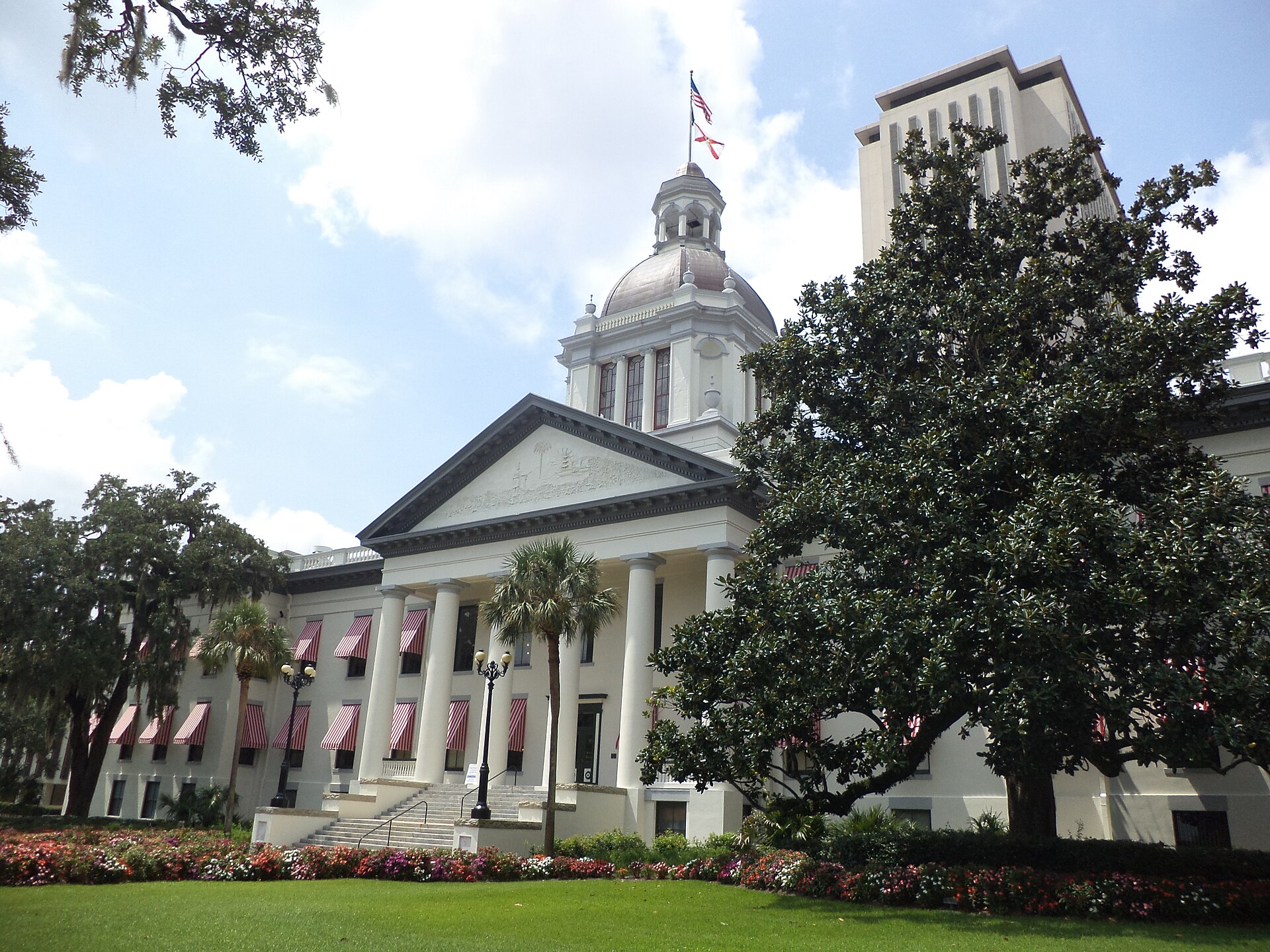 Florida's Historic Capitol in front of the modern Florida State Capitol tower in Tallahassee